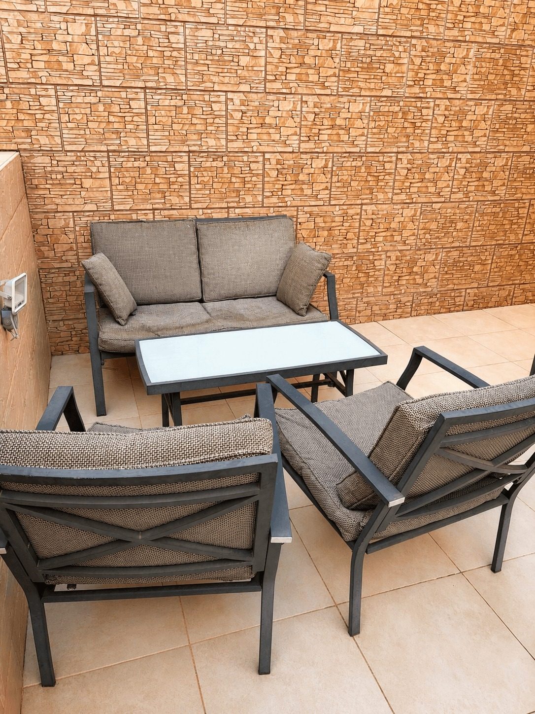 The Ussishkin Rooftop — Outdoor lounge seating on the terrace